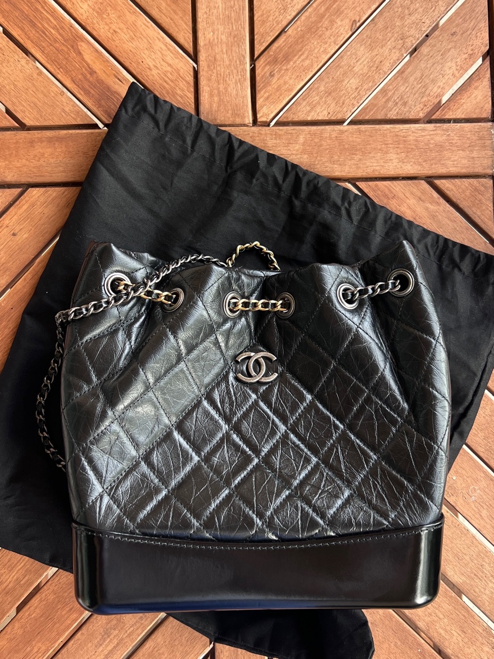 Genuine Leather Quilted Bucket Backpack Black Chain Strap